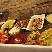 Hot buffet dishes at Chom Chom Canterbury